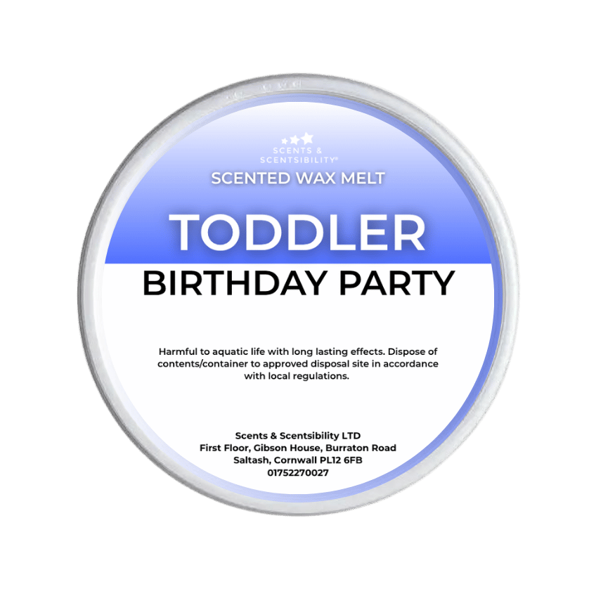 A Scents & Scentsibility 'Toddler Birthday Party' scented wax melt, shown against a solid dark green background.