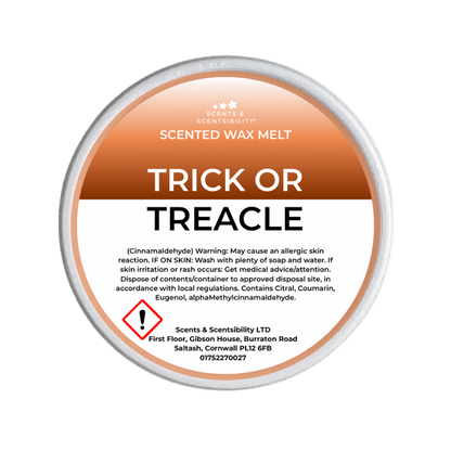 Scented wax melt container labeled 'Trick or Treacle' on a green background
