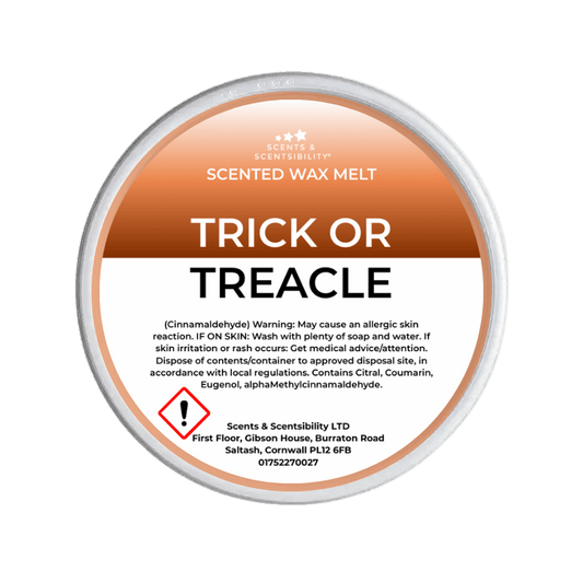 Scented wax melt container labeled 'Trick or Treacle' on a green background