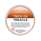Scented wax melt container labeled 'Trick or Treacle' on a green background