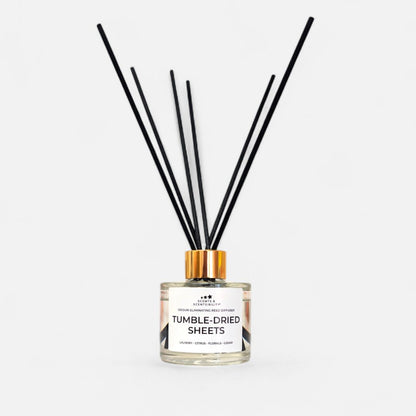 Diffuser with black sticks on a white background