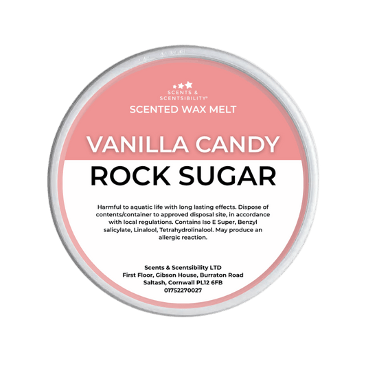 Vanilla Candy Rock Sugar scented wax melt container with label on a green background