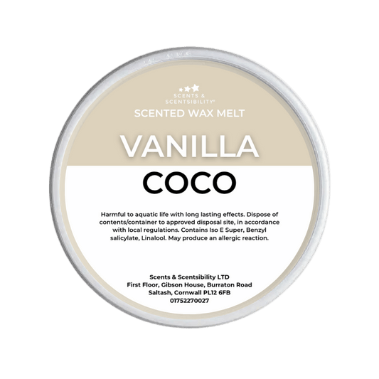 Vanilla Coco scented wax melt container with label on a green background