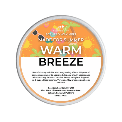 A wax melt pot with a colourful label called 'Warm Breeze' on a transparent background