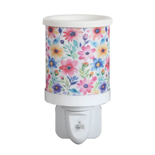 A Mini Plug In Wax Melt Warmer with colourful Daisy print