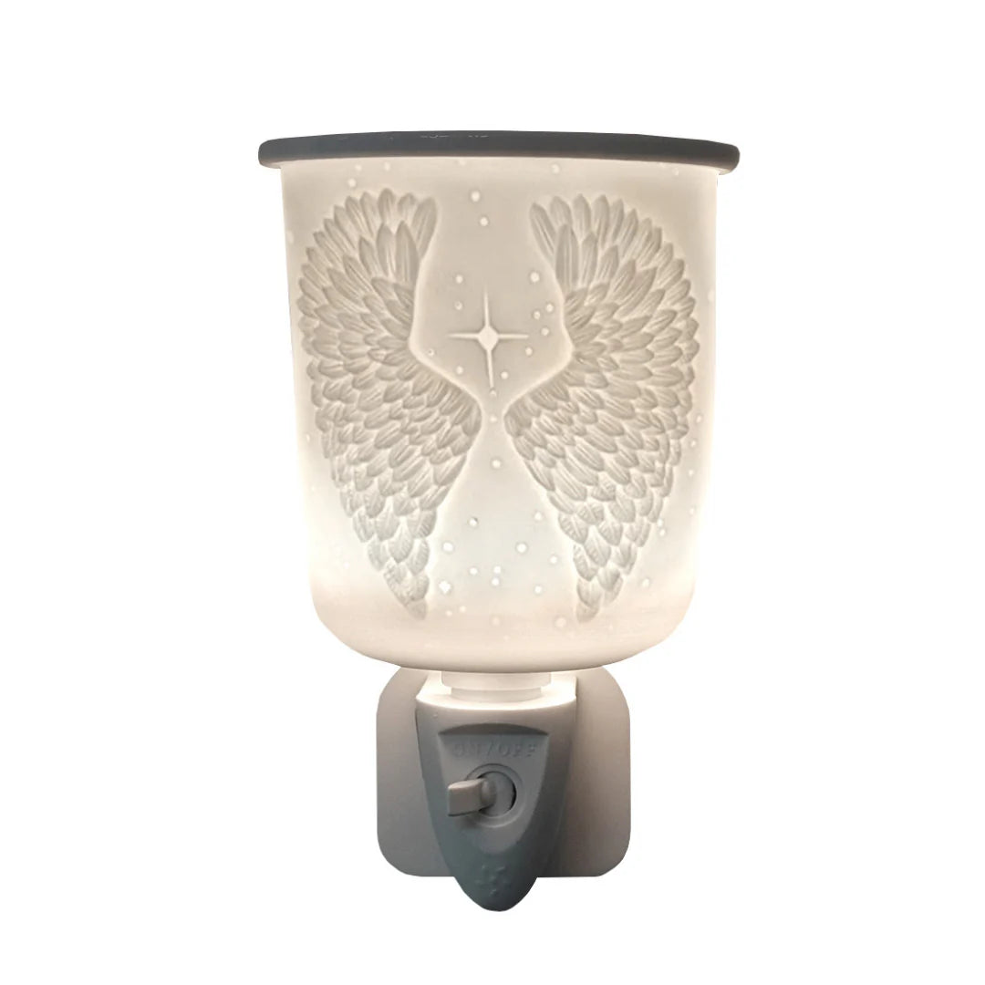 Decorative wax warmer with angel wings design on a white background