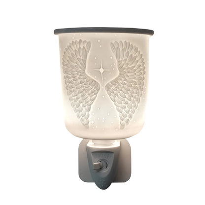 Decorative wax warmer with angel wings design on a white background