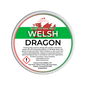 Scented wax melt container labeled 'Welsh Dragon' with branding and warning text on a green background.