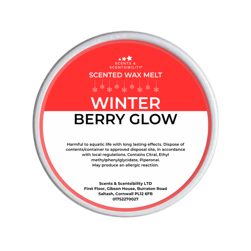 Scented wax melt container labeled 'Winter Berry Glow' on a green background