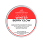 Scented wax melt container labeled 'Winter Berry Glow' on a green background