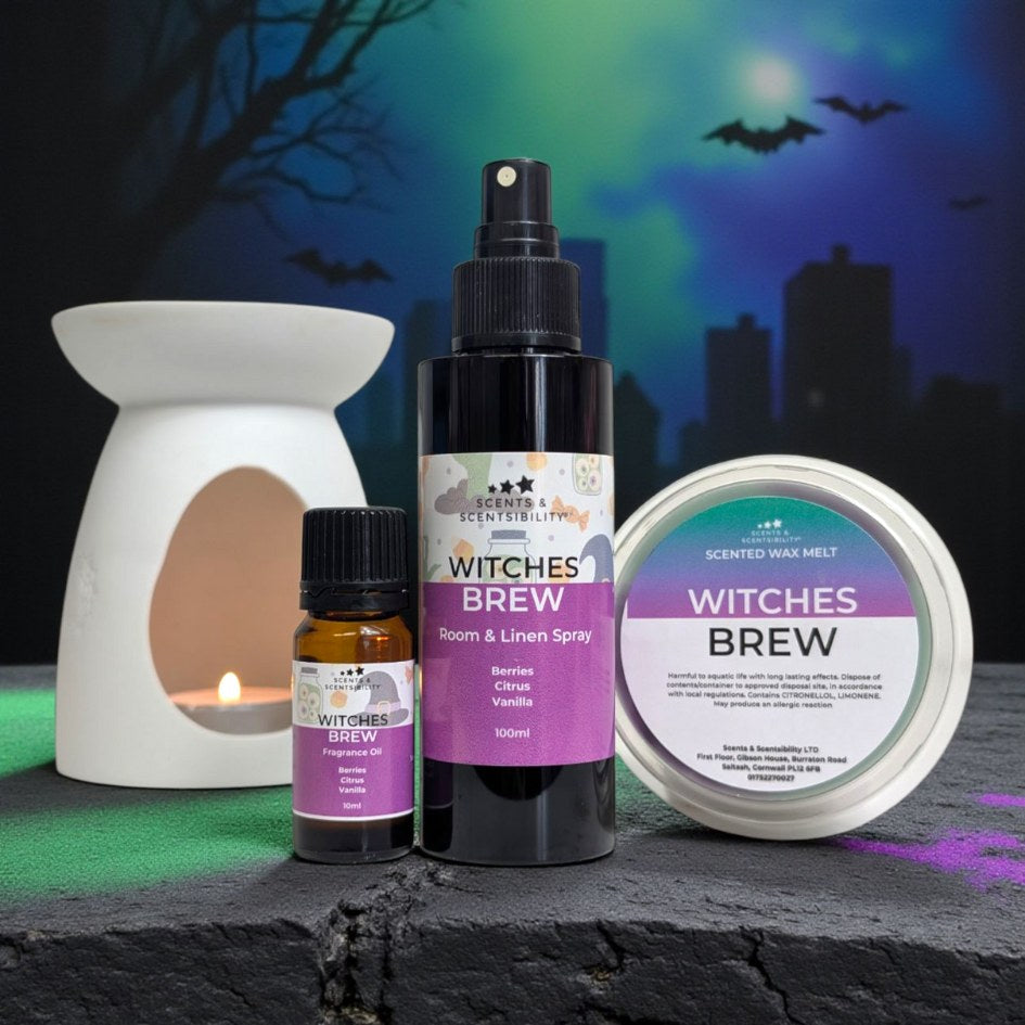 Witches Brew themed products including a room spray bottle, fragrance oil, and wax melt against a Halloween-themed background.