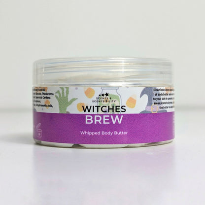Jar of 'Witches Brew' whipped body butter with a purple label on a white background