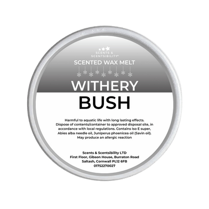 Scented wax melt container labeled 'Withery Bush' on a green background