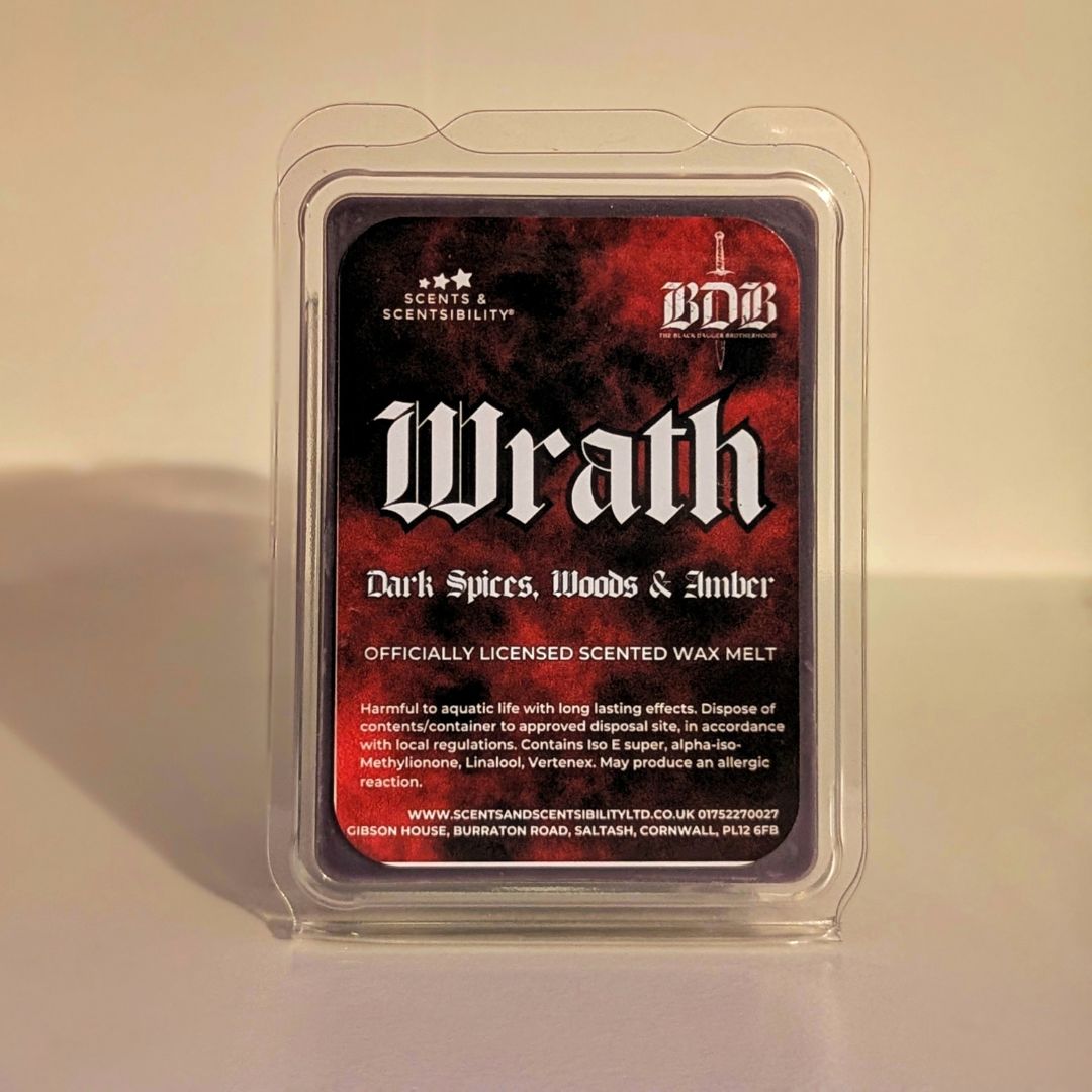 Scented wax melt package labeled 'Wrath' with branding on a beige background