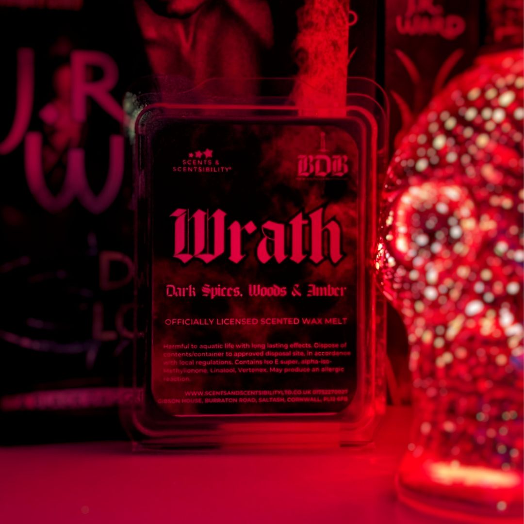 Wax melt packaging labeled 'Wrath' with red and black design.