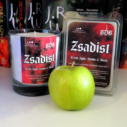BDB 'Zsadist' scented candle and wax melt with a green apple on a white surface.